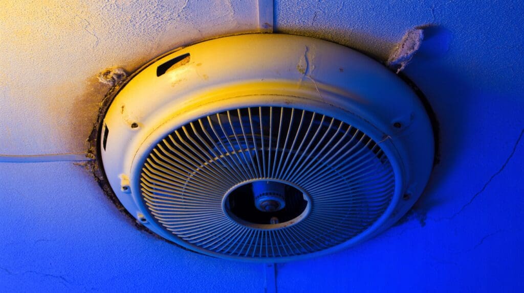 Old noisy exhaust fan showing wear and poor ventilation in Reno home